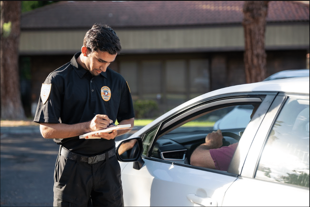Officer checking vehicle access