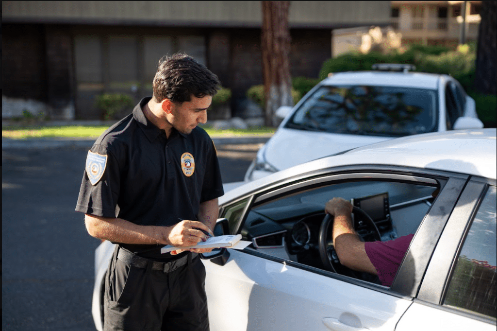 Guard speaking with driver